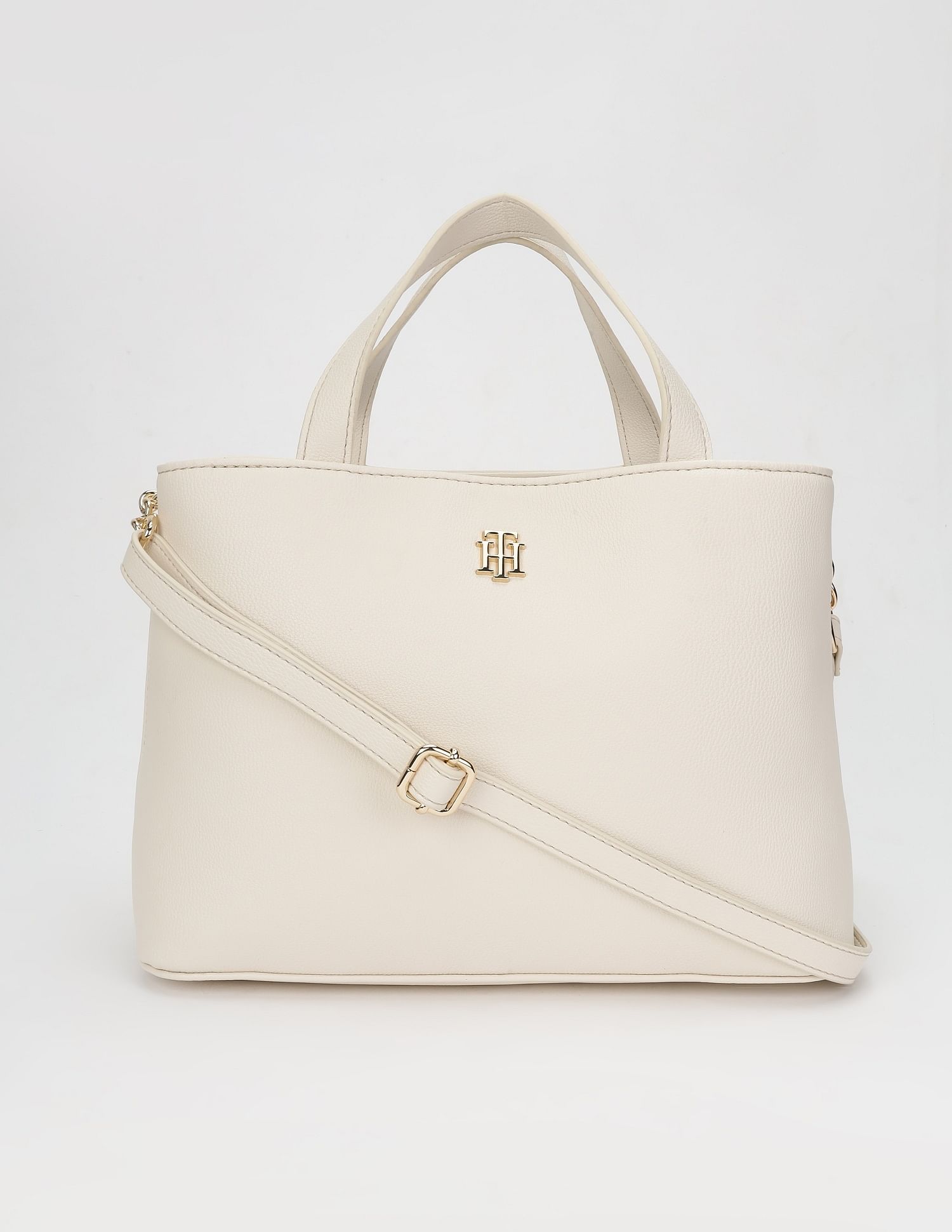 Tommy Hilfiger Solid Beige Cotton Handbags