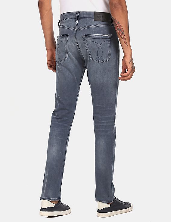 Buy Calvin Klein Men Blue Athletic Tapered Fit Clean Look Jeans NNNOW