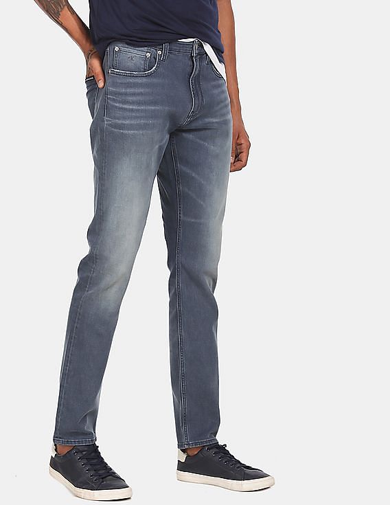 Calvin klein athletic outlet taper jeans