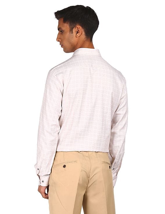 beige shirt with khaki pants