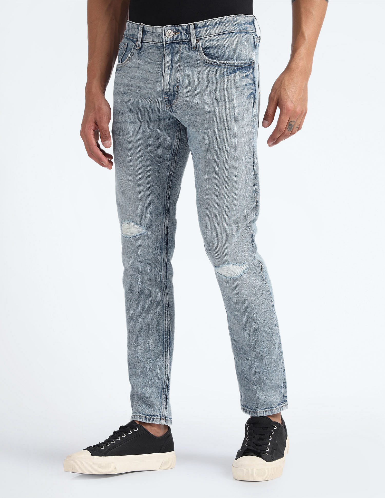 Ripped slim taper fit store jeans