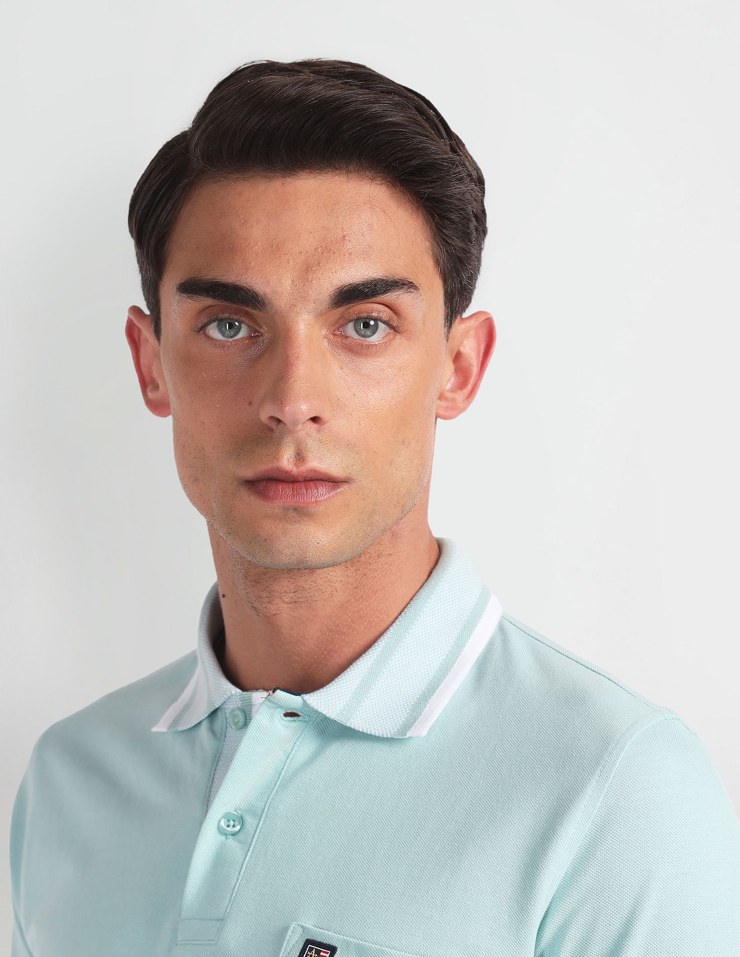 Arrow Sports Striped Collar Solid Polo Shirt