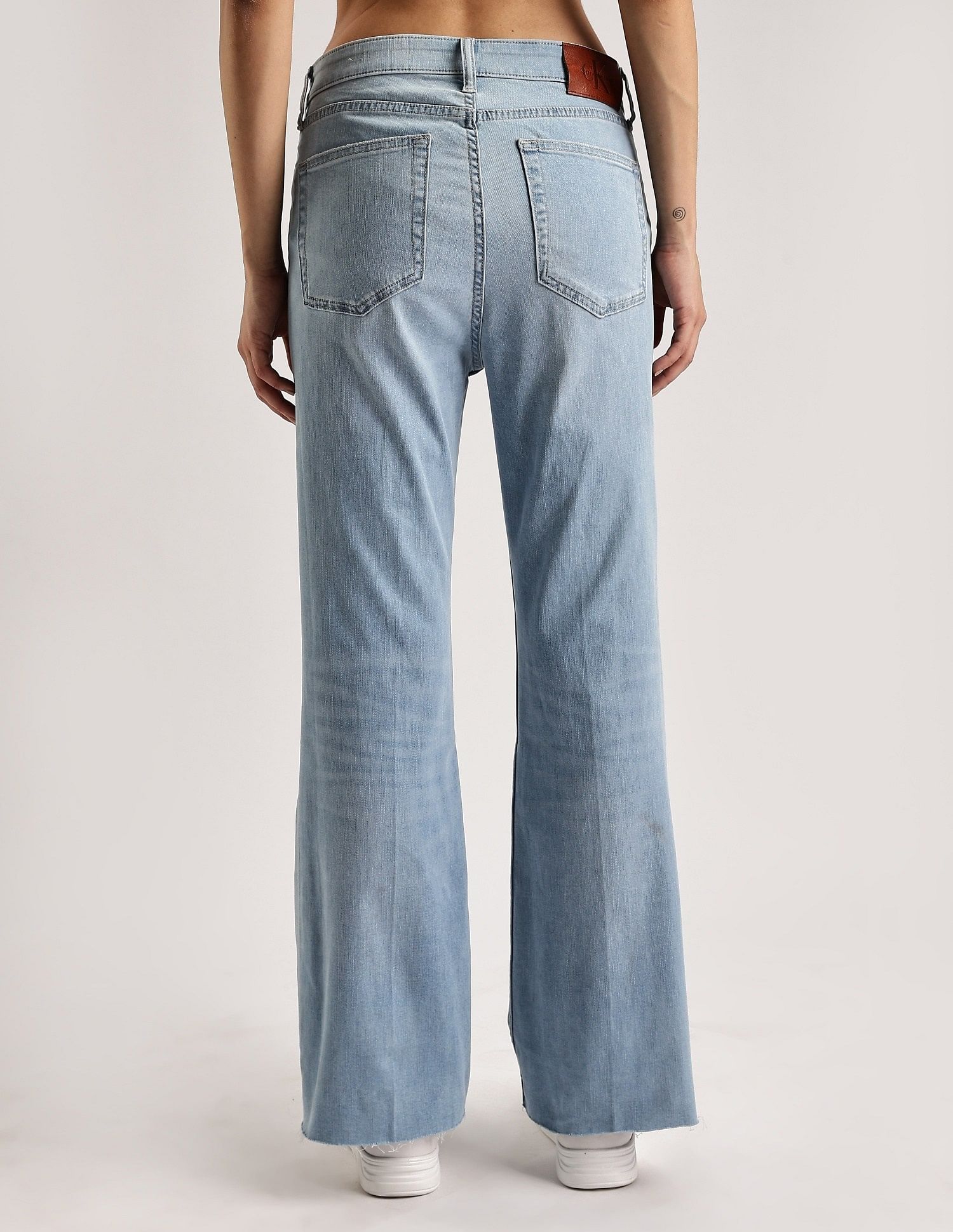 Calvin Klein Jeans Light-Wash Mid Rise Bootcut Jeans