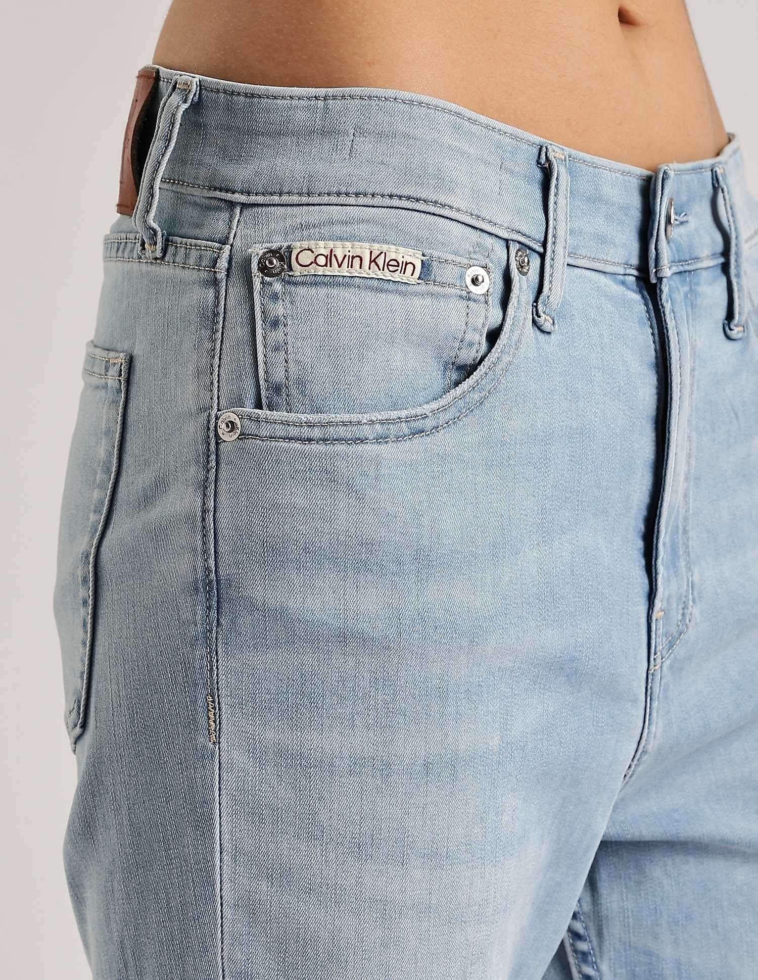 Calvin Klein Jeans Light-Wash Mid Rise Bootcut Jeans
