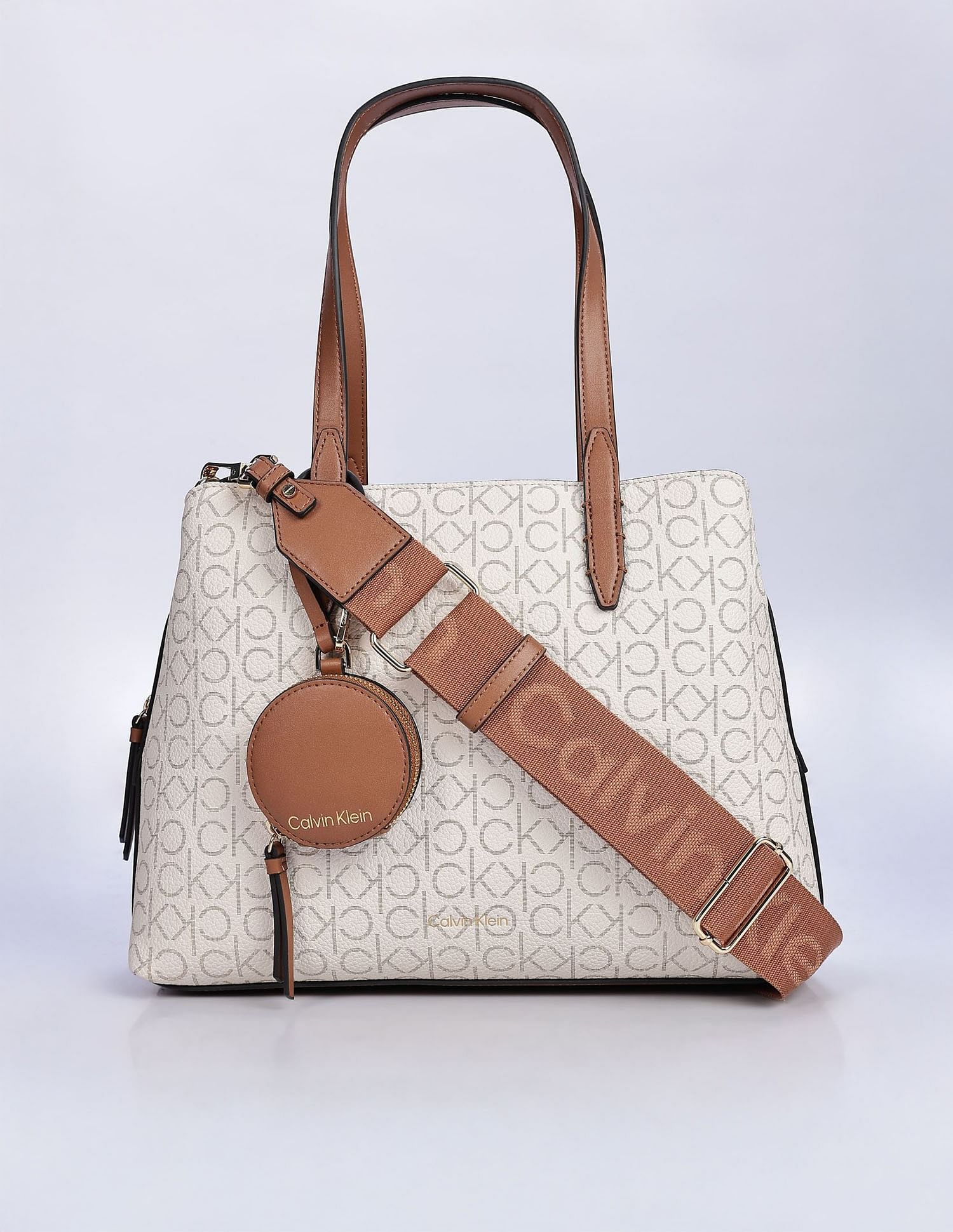 Calvin Klein Printed Beige Pvc Hand Bags