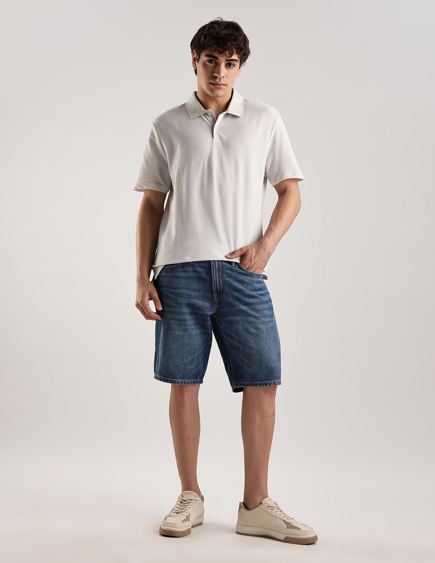 Calvin Klein Jeans Solid Regular-Fit Cotton Polo T-Shirt
