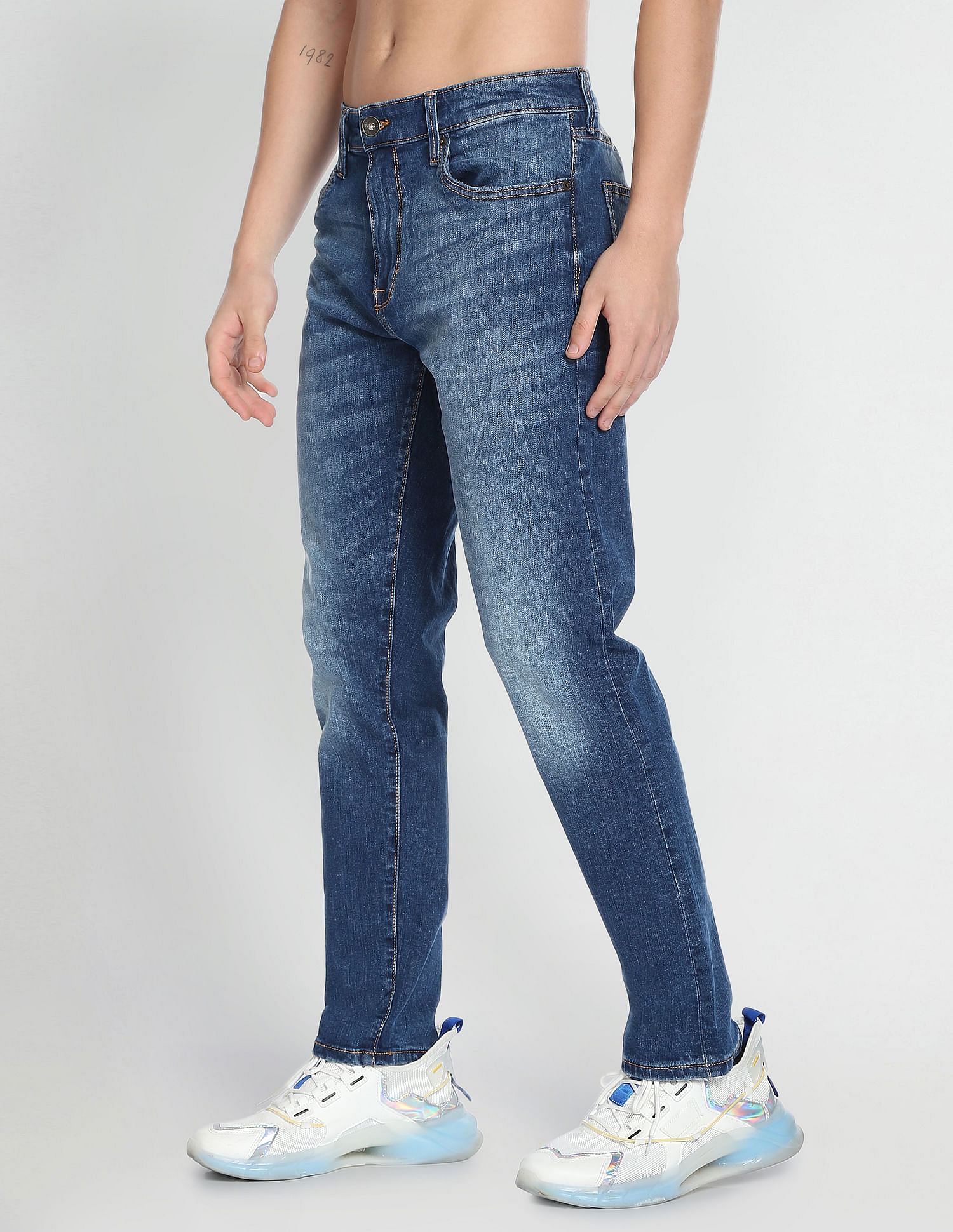 Flying Machine Slash Slim Tapered Fit Mid Rise Jeans