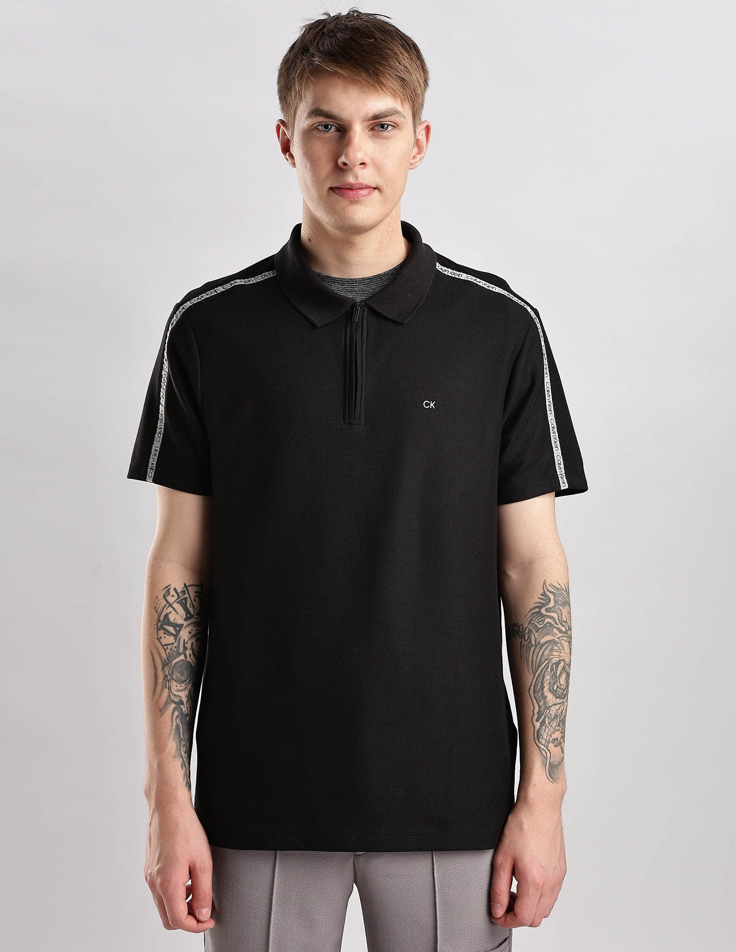 Calvin Klein Jeans Mens Black Solid Polo Shirts
