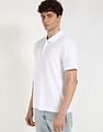 Calvin Klein Jeans Self Design Regular-Fit Polyester Polo T-Shirt