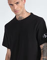 Calvin Klein Jeans Sustainable Logo Badge Waffle T-Shirt