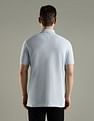 Tommy Hilfiger Solid Regular Fit Cotton Polo T-Shirt
