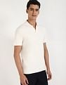 Tommy Hilfiger Solid Regular-Fit Cotton Polo Shirt