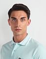 Arrow Sports Striped Collar Solid Polo Shirt