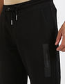 Calvin Klein Jeans Regular-Fit Solid Mid Rise Trouser