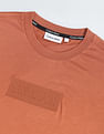 Calvin Klein Transitional Cotton Raised Rubber Logo T-Shirt